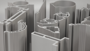 Extruded aluminum profiles used in aerospace machining.